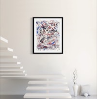 an abstract painting on a wall next to a staircase