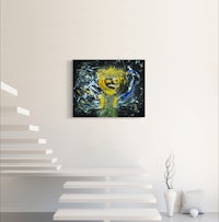 a painting of a yellow flower on a white wall